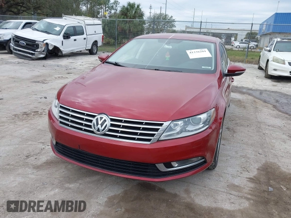 2014 Volkswagen CC Sport with VIN WVWBN7AN0EE527558, listed as a IAAI auction lot 41336204 with 130,005 mi miles and . Bid and sale history available at DreamBid. Image 6.