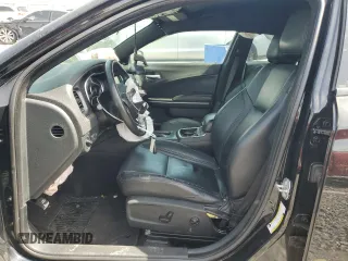 2018 Dodge Charger SXT Plus with VIN 2C3CDXHG2JH329120, listed as a Copart auction lot 49746455 with 106,182 mi miles and Salvage Title. Bid and sale history available at carsss.com. Image 7.