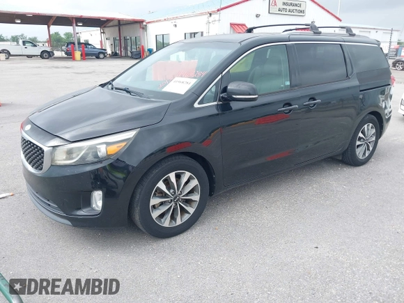 2015 Kia Sedona EX with VIN KNDMC5C11F6038255, listed as a IAAI auction lot 41968284 with 130,765 mi miles. Bid and sale history available at carsss.com. Image 2.
