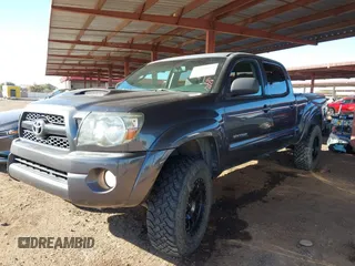 2011 Toyota Tacoma with VIN 3TMMU4FN0BM032561, listed as a IAAI auction lot 41190472 with 188,862 mi miles and . Bid and sale history available at DreamBid. Image 2.