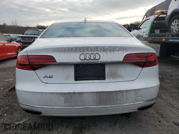2015 Audi A8 z VIN WAUJGAFD9FN003570, wystawiony jako Copart lot #87642905 z przebiegiem 71 523 mil mil oraz Czysty tytuł • Clean title. Historia ofert i sprzedaży dostępna na DreamBid. Obrazek 6.