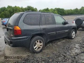 2005 GMC Envoy SLT with VIN 1GKDT13S452324077, listed as a Copart auction lot 57836195 with 299,146 mi miles and Clean title. Bid and sale history available at DreamBid. Image 3.