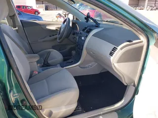 2009 Toyota Corolla with VIN 1NXBU40E39Z119288, listed as a IAAI auction lot 40477607 with 76,584 mi miles. Bid and sale history available at carsss.com. Image 5.