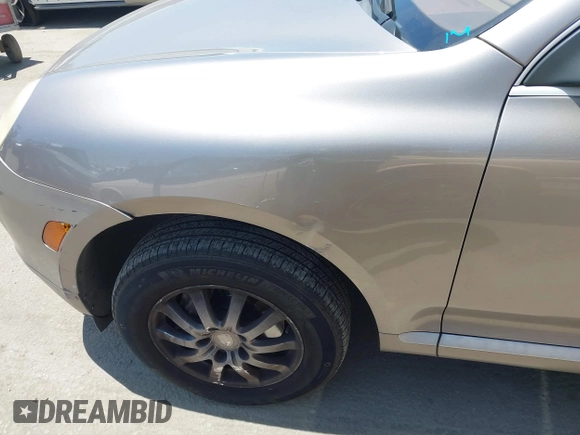 2005 Porsche Cayenne z VIN WP1AA29P55LA24408, wystawiony jako IAAI lot #42398234 z przebiegiem 237 890 mil mil oraz . Historia ofert i sprzedaży dostępna na DreamBid. Obrazek 12.