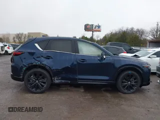 2022 Mazda CX-5 2.5 Turbo with VIN JM3KFBAY8N0635618, listed as a IAAI auction lot 41199038 with Not Provided miles and . Bid and sale history available at carsss.com. Image 13.