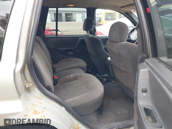 2001 Jeep Grand Cherokee Laredo z VIN 1J4GW48S01C658017, wystawiony jako IAAI lot #42160310 z przebiegiem 220 309 mil mil oraz . Historia ofert i sprzedaży dostępna na DreamBid. Obrazek 8.
