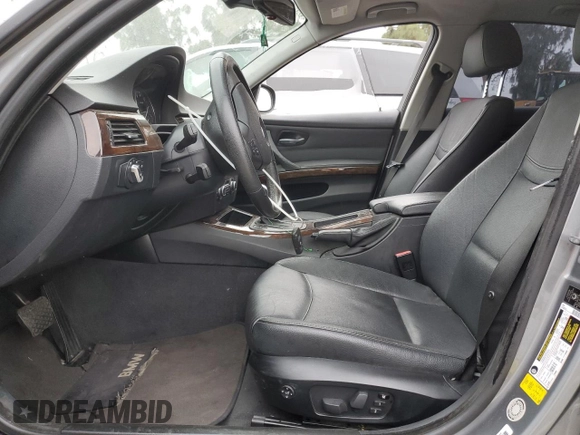 2010 BMW 3 Series 328i with VIN WBAPH5G51ANM36203, listed as a Copart auction lot 57349235 with 183,491 mi miles and Salvage title. Bid and sale history available at DreamBid. Image 7.