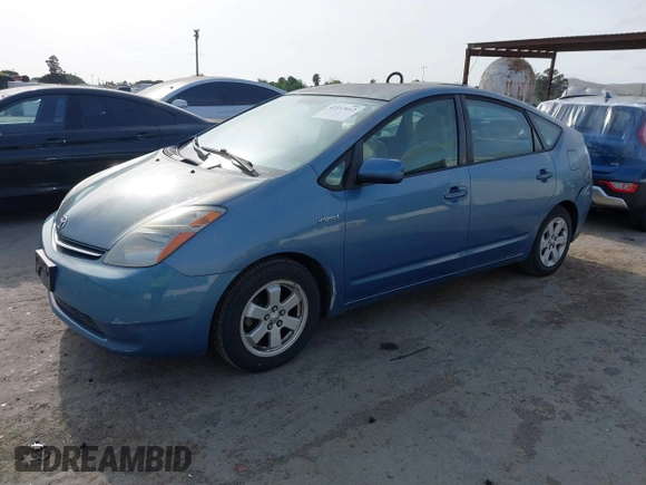2007 Toyota Prius with VIN JTDKB20U777643822, listed as a IAAI auction lot 42117612 with 202,704 mi miles and . Bid and sale history available at carsss.com. Image 2.