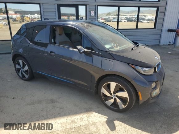 2014 BMW i3 with VIN WBY1Z4C56EV275504, listed as a Copart auction lot 57070015 with Not provided miles and Salvage title. Bid and sale history available at DreamBid. Image 4.