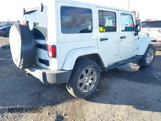 2017 Jeep Wrangler Unlimited Sahara with VIN 1C4BJWEG0HL587163, listed as a IAAI auction lot 41252399 with 84,983 mi miles. Bid and sale history available at carsss.com. Image 4.