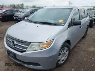 2012 Honda Odyssey LX with VIN 5FNRL5H22CB110569, listed as a IAAI auction lot 42151633 with 253,812 mi miles and . Bid and sale history available at carsss.com. Image 2.