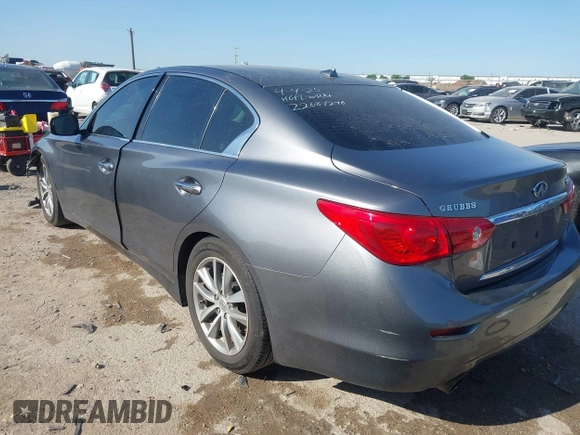 2014 Infiniti Q50 Hybrid Premium with VIN JN1AV7AP4EM691014, listed as a IAAI auction lot 41984130 with 114,230 mi miles and . Bid and sale history available at DreamBid. Image 3.