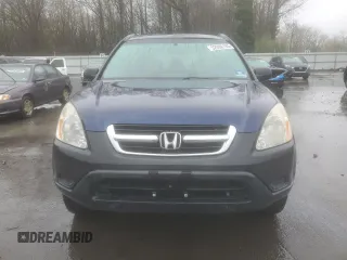 2004 Honda CR-V LX with VIN SHSRD78474U252663, listed as a Copart auction lot 52090185 with 202,703 mi miles and Salvage Title. Bid and sale history available at carsss.com. Image 5.