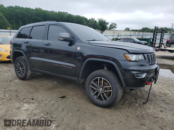 2017 Jeep Grand Cherokee Trailhawk with VIN 1C4RJFLG7HC674060, listed as a Copart auction lot 61130225 with 79,351 mi miles and Salvage title. Bid and sale history available at DreamBid. Image 4.