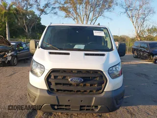 2020 Ford Transit Cargo with VIN 1FTBR1Y81LKB45460, listed as a IAAI auction lot 41496961 with 45,534 mi miles and . Bid and sale history available at DreamBid. Image 12.