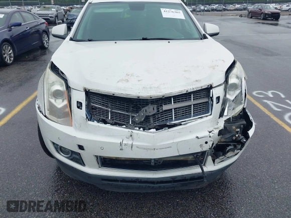 2012 Cadillac SRX Performance Collection with VIN 3GYFNBE38CS547423, listed as a IAAI auction lot 42276365 with 157,786 mi miles and . Bid and sale history available at DreamBid. Image 6.