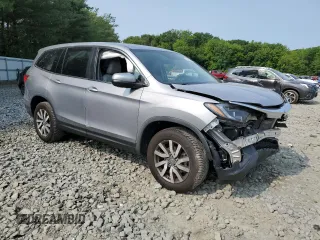 2020 Honda Pilot EX-L z VIN 5FNYF6H5XLB008097, wystawiony jako Copart lot #59329285 z przebiegiem Nie podano mil oraz Szkoda całkowita • Salvage title. Historia ofert i sprzedaży dostępna na DreamBid. Obrazek 4.