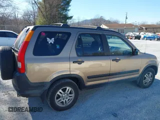 2002 Honda CR-V EX with VIN JHLRD78842C059829, listed as a IAAI auction lot 41687910 with 303,313 mi miles. Bid and sale history available at carsss.com. Image 6.