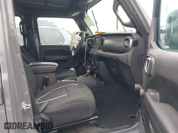 2022 Jeep Wrangler Unlimited High Tide with VIN 1C4HJXDG8NW126143, listed as a IAAI auction lot 41507703 with 44,472 mi miles and . Bid and sale history available at DreamBid. Image 5.