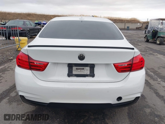 2014 BMW 4 Series 428i xDrive with VIN WBA3N5C56EK196702, listed as a IAAI auction lot 40934482 with 120,292 mi miles. Bid and sale history available at carsss.com. Image 17.
