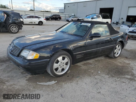 1999 Mercedes-Benz SL-Class with VIN WDBFA68F0XF186163, listed as a Copart auction lot 82669544 with 184,054 mi miles and Salvage Title. Bid and sale history available at carsss.com. Image 1.