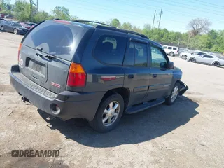2005 GMC Envoy SLE with VIN 1GKDT13S552253519, listed as a IAAI auction lot 42113617 with 172,058 mi miles and . Bid and sale history available at DreamBid. Image 4.