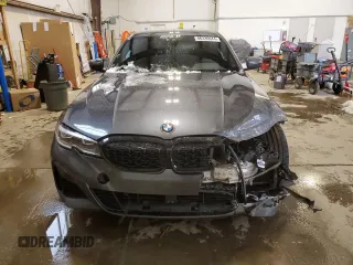2022 BMW 3 Series M340i xDrive with VIN WBA5U9C02NFL66019, listed as a Copart auction lot 86330044 with 42,394 mi miles and Salvage Title. Bid and sale history available at DreamBid. Image 5.