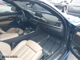 2015 BMW M4 with VIN WBS3U9C5XFJ968082, listed as a IAAI auction lot 41513593 with 57,715 mi miles. Bid and sale history available at carsss.com. Image 5.