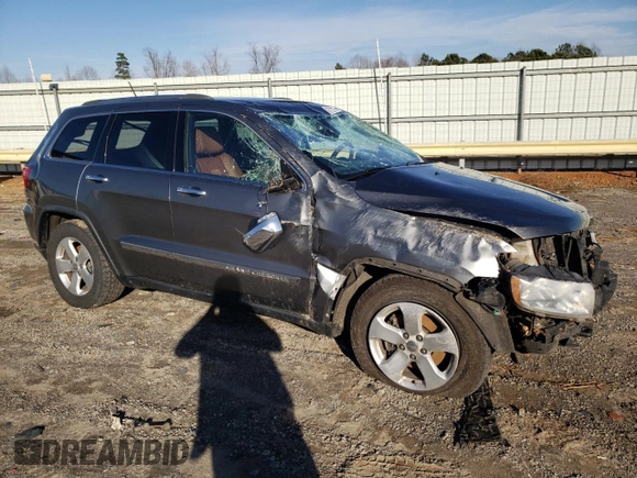 2013 Jeep Grand Cherokee Overland with VIN 1C4RJFCG0DC607214, listed as a Copart auction lot 43672575 with 188,026 mi miles and Salvage Title. Bid and sale history available at carsss.com. Image 4.