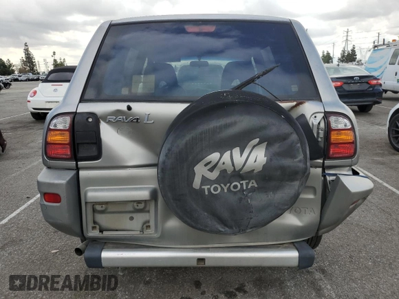 1999 Toyota RAV4 with VIN JT3GP10V0X7054819, listed as a Copart auction lot 44864015 with 140,095 mi miles and Salvage Title. Bid and sale history available at DreamBid. Image 6.