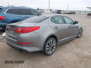 2014 Kia Optima SXL Turbo with VIN 5XXGR4A67EG336118, listed as a IAAI auction lot 41613725 with 121,671 mi miles and . Bid and sale history available at DreamBid. Image 4.