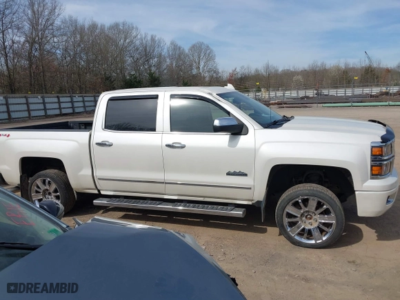 2015 Chevrolet Silverado 1500 High Country with VIN 3GCUKTEC7FG205805, listed as a IAAI auction lot 41815859 with 130,028 mi miles. Bid and sale history available at carsss.com. Image 13.