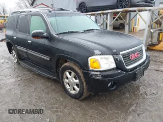 2005 GMC Envoy XL SLE with VIN 1GKET16S156160473, listed as a IAAI auction lot 41510661 with 233,942 mi miles. Bid and sale history available at carsss.com. Image 1.