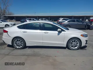 2019 Ford Fusion SE with VIN 3FA6P0HD0KR215531, listed as a IAAI auction lot 41867778 with 101,893 mi miles. Bid and sale history available at carsss.com. Image 13.