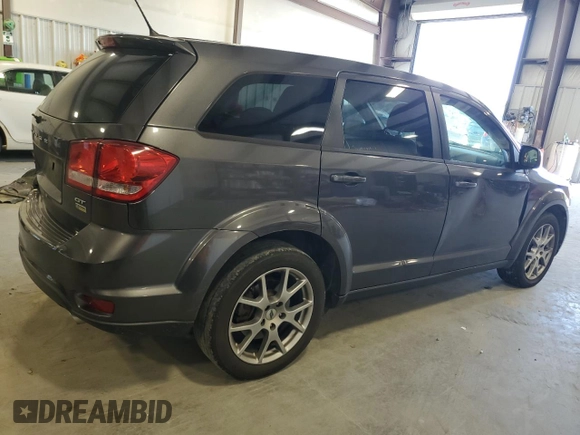 2018 Dodge Journey GT with VIN 3C4PDCEG6JT380458, listed as a Copart auction lot 57725795 with 130,329 mi miles and Salvage title. Bid and sale history available at DreamBid. Image 3.