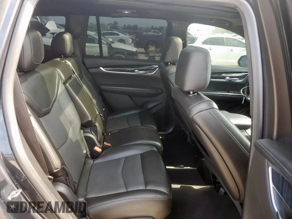 2022 Cadillac XT6 Premium Luxury z VIN 1GYKPCRS1NZ104567, wystawiony jako Copart lot #58211505 z przebiegiem 54 541 mil mil oraz Tytuł czysty. Historia ofert i sprzedaży dostępna na DreamBid. Obrazek 11.