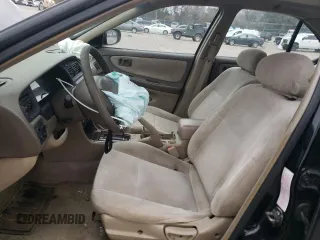 1999 Nissan Altima XE with VIN 1N4DL01D6XC265529, listed as a Copart auction lot 43203205 with 155,388 mi miles and Salvage Title. Bid and sale history available at carsss.com. Image 7.