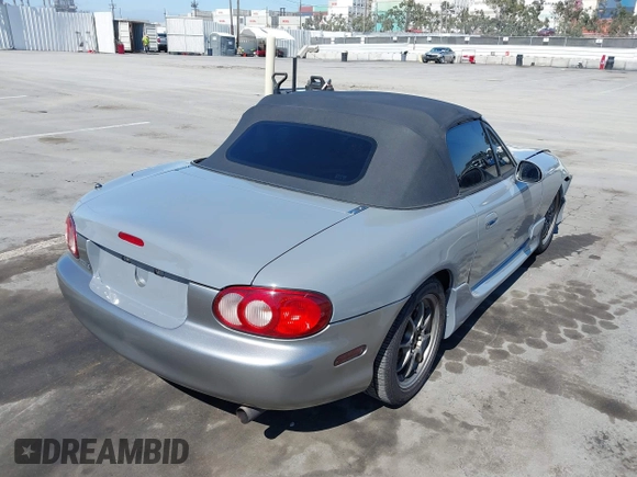 2003 Mazda MX-5 Miata Cloth with VIN JM1NB353930309670, listed as a IAAI auction lot 42234586 with 220,979 mi miles and . Bid and sale history available at DreamBid. Image 4.