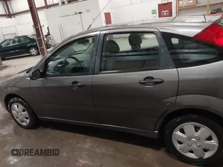 2007 Ford Focus S with VIN 1FAFP37N87W333049, listed as a IAAI auction lot 41450683 with 307,869 mi miles and . Bid and sale history available at carsss.com. Image 14.
