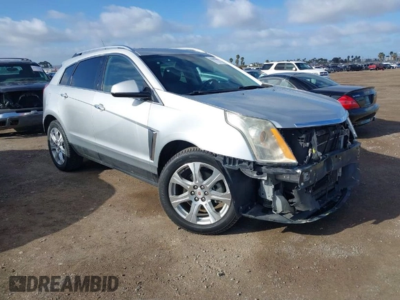 2014 Cadillac SRX Performance Collection with VIN 3GYFNCE39ES544135, listed as a IAAI auction lot 41808644 with 145,772 mi miles and . Bid and sale history available at carsss.com. Image 1.