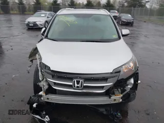 2012 Honda CR-V EX-L with VIN 2HKRM3H71CH508077, listed as a IAAI auction lot 41969207 with 75,768 mi miles. Bid and sale history available at carsss.com. Image 12.