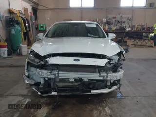2019 Ford Fusion Titanium with VIN 3FA6P0D92KR153096, listed as a IAAI auction lot 41679393 with 127,292 mi miles and . Bid and sale history available at DreamBid. Image 6.