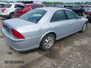 2002 Lincoln LS w/Base Pkg with VIN 1LNHM86S62Y672921, listed as a IAAI auction lot 42100871 with 207,170 mi miles. Bid and sale history available at carsss.com. Image 4.