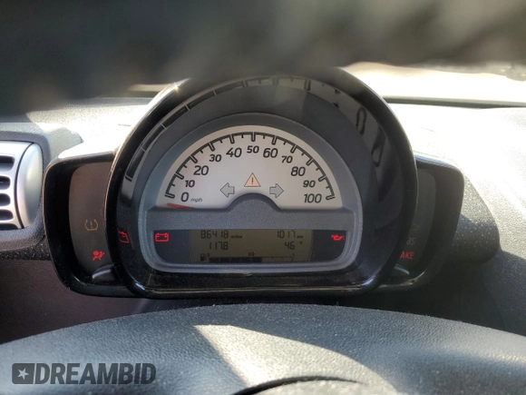 2010 Smart fortwo Pure with VIN WMEEJ3BA4AK341838, listed as a Copart auction lot 42514165 with 86,418 mi miles and Salvage title. Bid and sale history available at DreamBid. Image 9.
