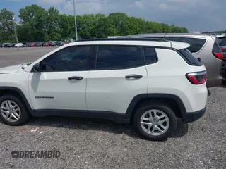 2018 Jeep Compass Sport with VIN 3C4NJCAB0JT124679, listed as a IAAI auction lot 42720262 with 119,267 mi miles and . Bid and sale history available at DreamBid. Image 14.