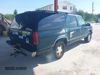 1995 GMC Suburban z VIN 1GKFK16K9SJ728534, wystawiony jako IAAI lot #42358029 z przebiegiem 279 148 mil mil oraz . Historia ofert i sprzedaży dostępna na DreamBid. Obrazek 4.