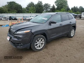 2016 Jeep Cherokee Altitude with VIN 1C4PJMCB2GW277417, listed as a Copart auction lot 61575165 with 125,396 mi miles and Salvage title. Bid and sale history available at DreamBid. Image 1.