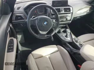 2016 BMW 2 Series 228i with VIN WBA1K9C52GV321798, listed as a Copart auction lot 45011725 with 56,673 mi miles and Salvage Title. Bid and sale history available at carsss.com. Image 8.