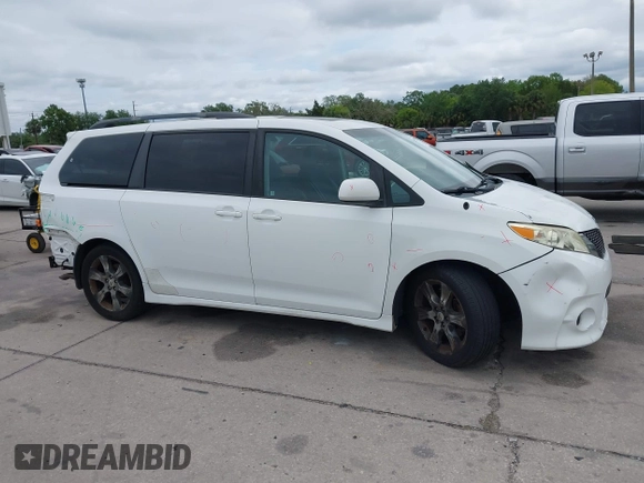 2011 Toyota Sienna SE with VIN 5TDXK3DC1BS069696, listed as a IAAI auction lot 41976857 with 160,994 mi miles. Bid and sale history available at carsss.com. Image 14.