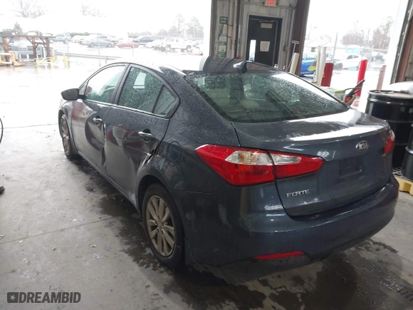 2014 Kia Forte LX with VIN KNAFX4A69E5237321, listed as a IAAI auction lot 41534280 with 100,810 mi miles. Bid and sale history available at carsss.com. Image 3.